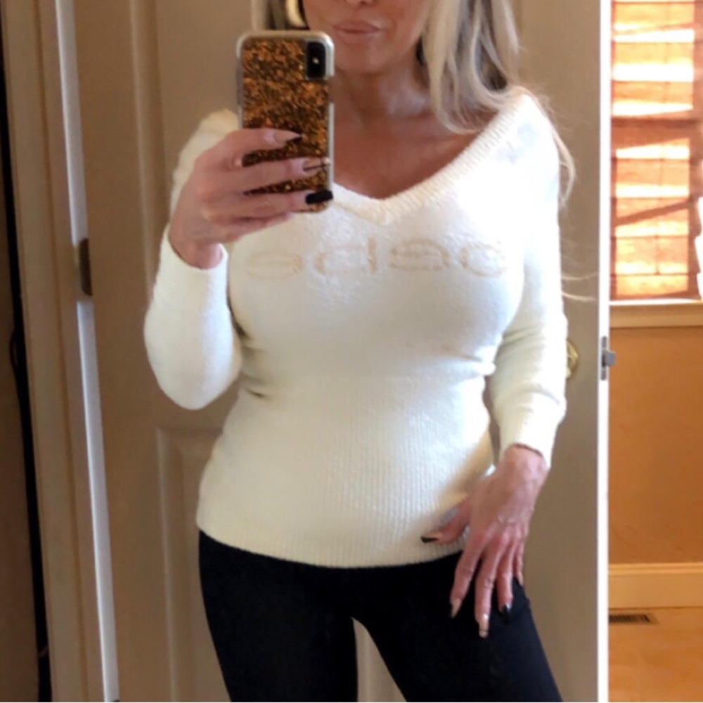 White V-neck bebe sweater brand new never worn